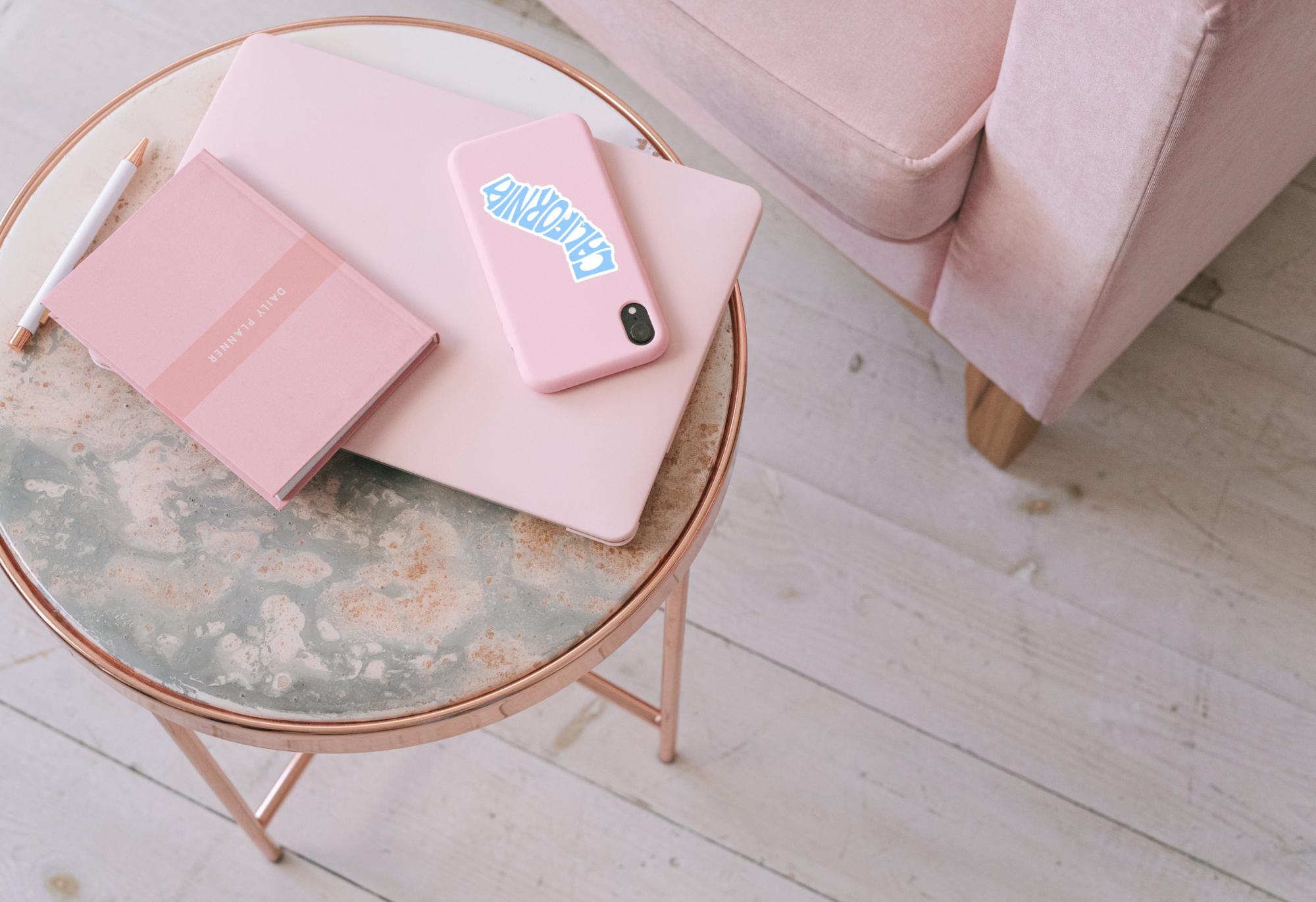 pale pink imprinted phone case with California design on it